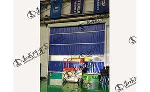 沈陽特變電工大型快速堆積門案例 - 中出網(wǎng)-智能出入口與停車充電門戶